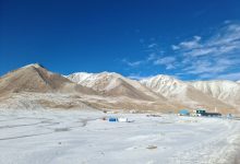 Panoramic view of snowy mountains at Khunjerab Pass on the China-Pakistan border.